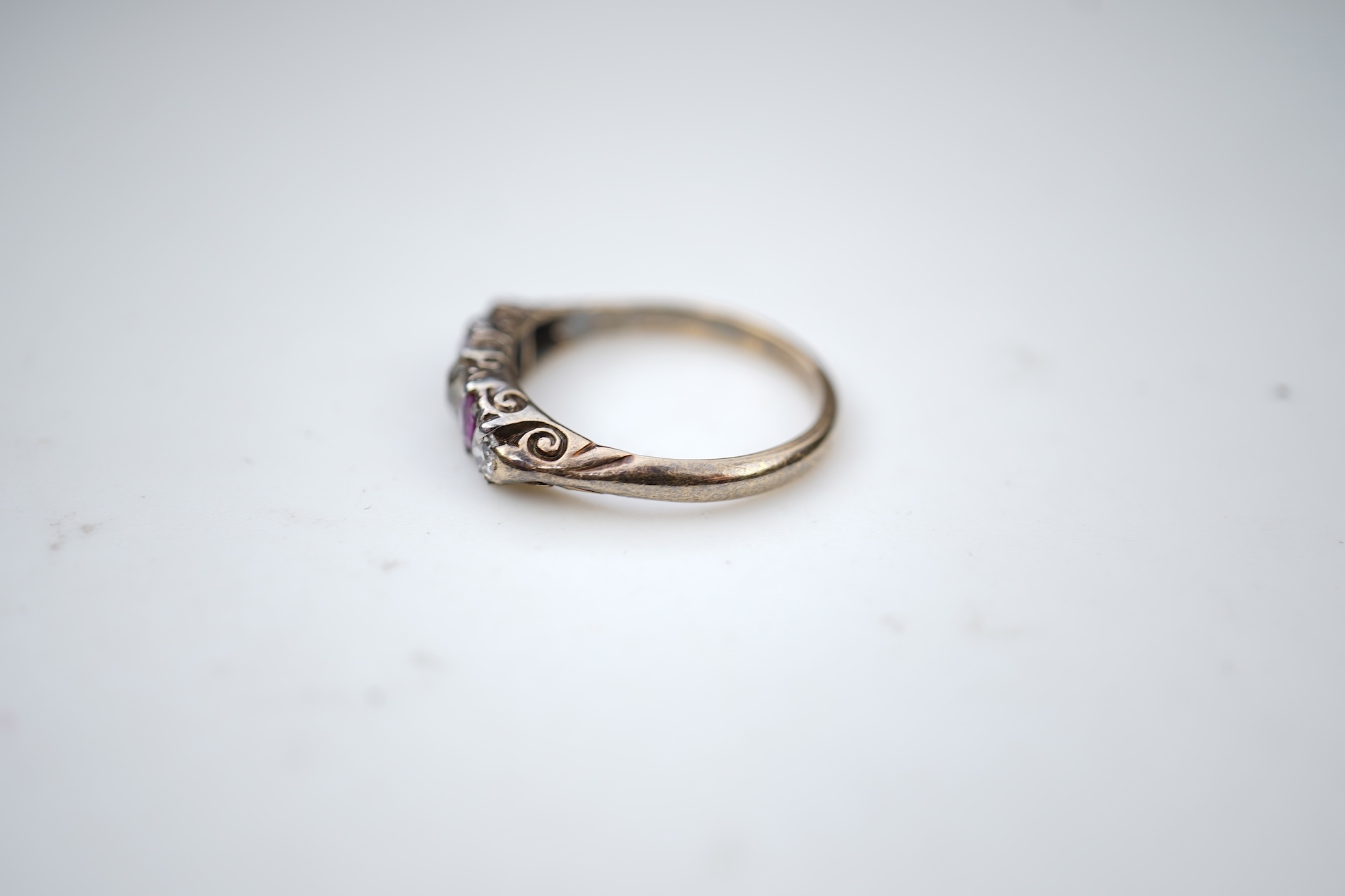 A pink sapphire and diamond ring, early 20th century
